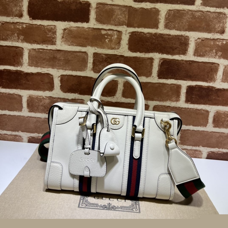 G*u*i shopping bags